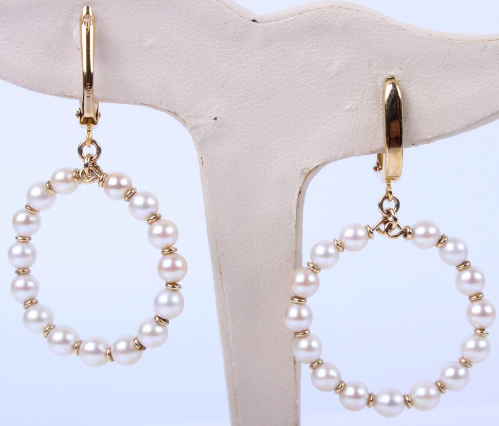 14K YELLOW GOLD PEARL LADIES HOOP EARRINGS: 116044 14K YELLOW GOLD PEARL LADIES HOOP EARRINGS 14k yellow gold pearl ladies hoop earrings with 30 combined 4.1mm to 4.3mm sized pearls. Pearl Weight: 6.16 GramsSize: 2" Length Condition: Very fine.