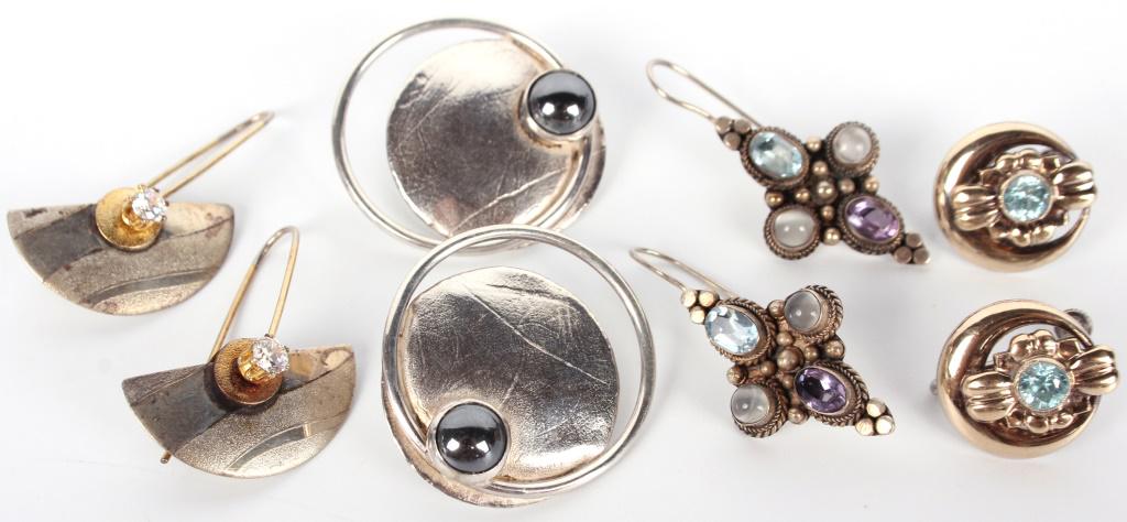 4 PAIRS OF VINTAGE STERLING SILVER EARRINGS: 116081 4 PAIRS OF VINTAGE STERLING SILVER EARRINGS 4 pairs of vintage sterling silver earrings to include one Whiting an Davis pair and gemstones to include amethyst, moonstone, and topaz.Weight: 25.8