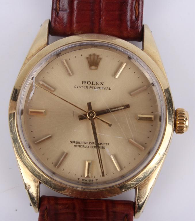 MENS ROLEX OYSTER PERPETUAL 1024 34MM GOLD WATCH: 116331 MENS ROLEX OYSTER PERPETUAL 1024 34MM GOLD WATCH Mens Rolex Oyster perpetual 1024 34mm Gold-Capped Automatic watch. The band of the watc his made of high quality leather. Rolex MensWeight: 46.2