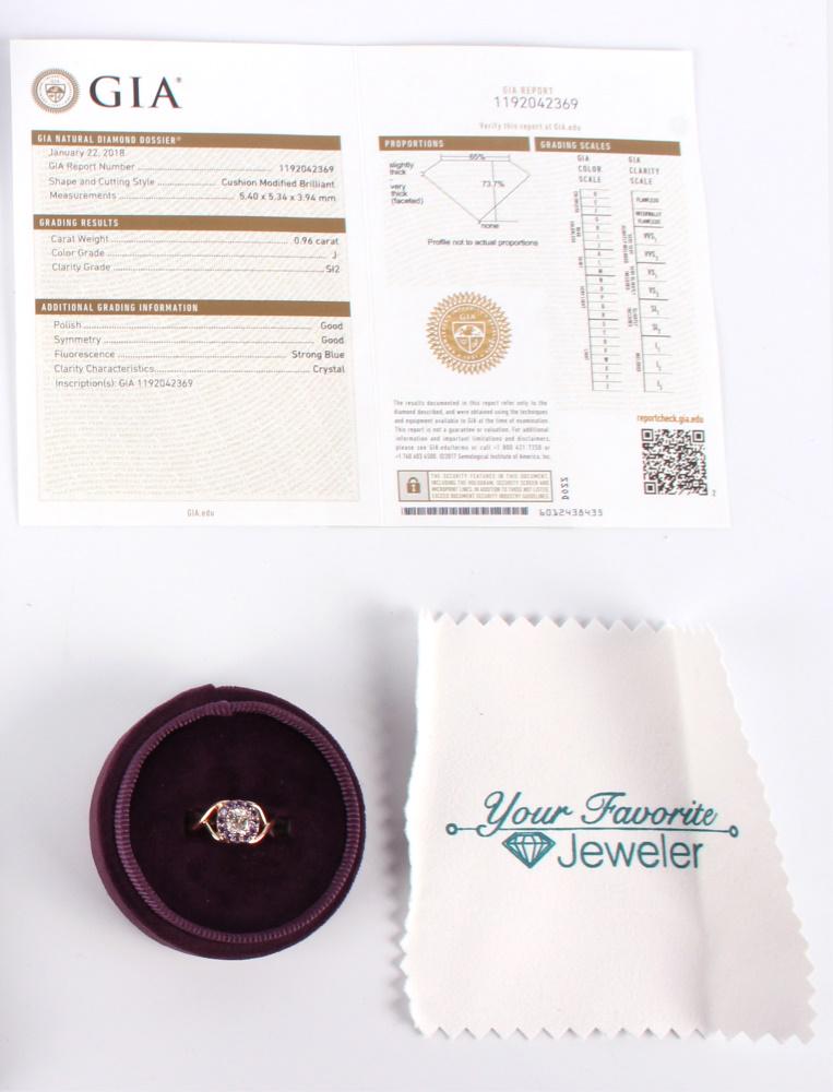 14K WHITE & ROSE GOLD .96CT DIAMOND TANZANITE RING: 128013 14K WHITE & ROSE GOLD .96CT DIAMOND TANZANITE RING 14K white and rose gold .96ct diamond tanzanite ring - A custom 14k white and rose gold overlapping size 7 twist hand style ring set with 1 .9