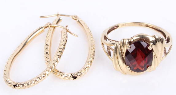 10K YELLOW GOLD LADIES EARRINGS & GARNET RING: 130005 10K YELLOW GOLD LADIES EARRINGS & GARNET RING 10k yellow gold ladies earrings and garnet ring with one 2.5ct oval garnet. Stone Type: Garnet Weight: 3.9 GramsSize: 1.25" Largest Condition: