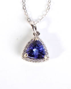 14K WHITE GOLD DIAMOND TANZANITE NECKLACE: 130011 14K WHITE GOLD DIAMOND TANZANITE NECKLACE 14k white gold diamond blue tanzanite necklace with twenty-four 0.01ct round diamonds, and one 7.2mm blue tanzanite. Stone Type: DiamondWeight: 2.6