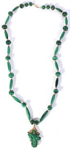 14K YELLOW GOLD DIAMOND MALACHITE NECKLACE: 130017a 14K YELLOW GOLD DIAMOND MALACHITE NECKLACE 14k yellow gold malachite beaded necklace with three 0.02ct round diamonds. Weight: 66.6 Grams Size: 23.5" LengthCondition: Very fine.