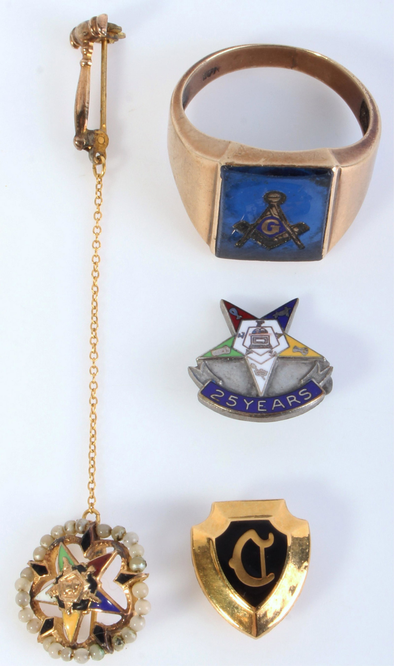 10K GOLD MASONIC JEWELRY - LOT OF 4: 131017 10K GOLD MASONIC JEWELRY - LOT OF 4 10K Gold Masonic jewelry - lot of 4. To include one Blue Topaz ring with the Masonic symbol with a "G" in it's center, one Masonic pin attached to a gavel pi