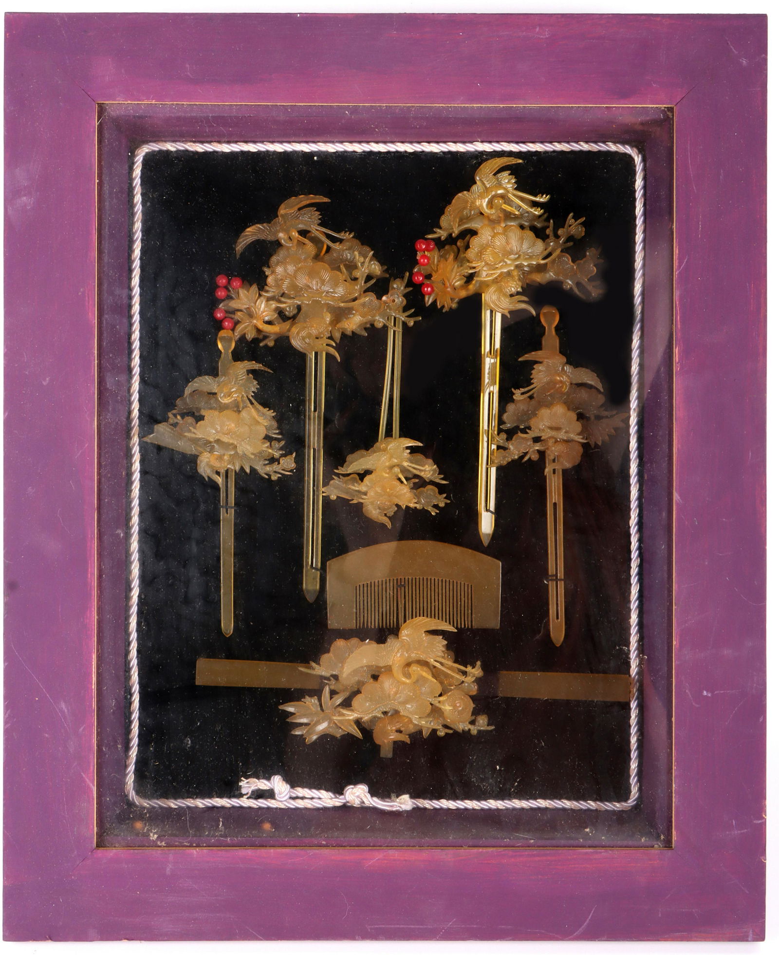 VINTAGE CHINESE BRIDAL HAIR PIN FRAMED SET: 140111 VINTAGE CHINESE BRIDAL HAIR PIN FRAMED SET Vintage Chinese bridal hair pin framed set with seven pins, combs, or accessories. Framed in a purple shadow box. Size: 17 X 14" FrameCondition: Very