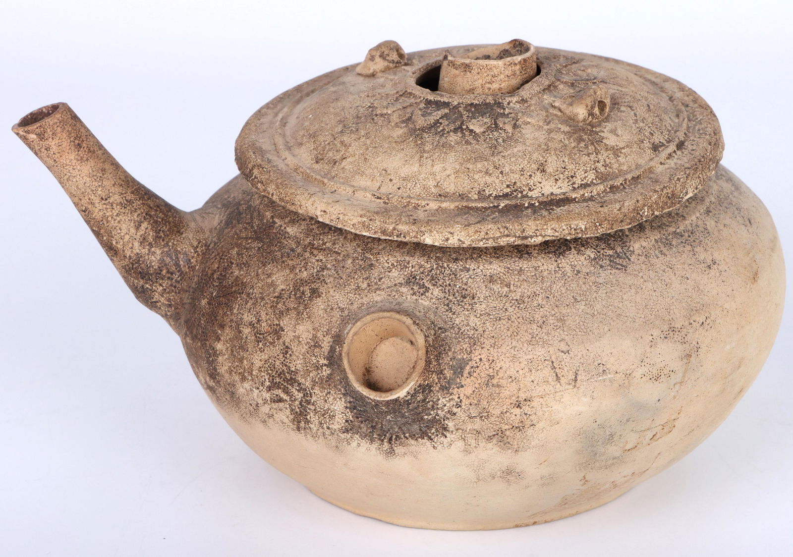 ANCIENT CHINESE BAKED CLAY TEAPOT WITH LID: 143130 ANCIENT CHINESE BAKED CLAY TEAPOT WITH LID Ancient baked clay teapot with lid, carved pattern design. Size: 5 x 8" Condition: Ancient, refer to image.