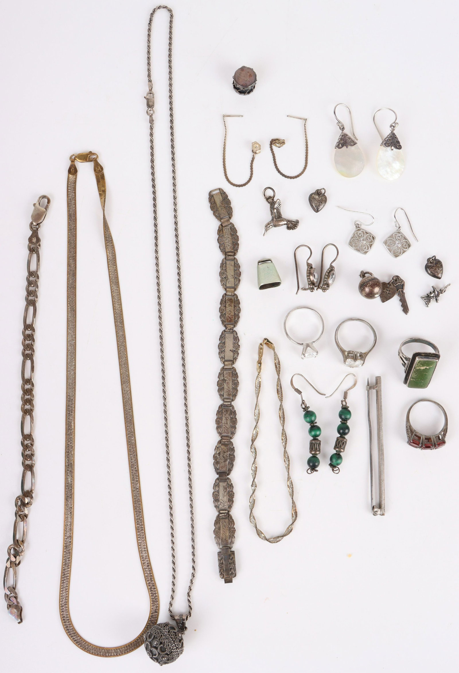 STERLING SILVER ANTIQUE LADIES JEWELRY: 146110 STERLING SILVER ANTIQUE LADIES JEWELRY Sterling silver antique ladies jewelry to include earrings, necklaces, rings, pendants, bracelets, charms, and more. Weight: 106.6 GramsSize: 20" Largest 