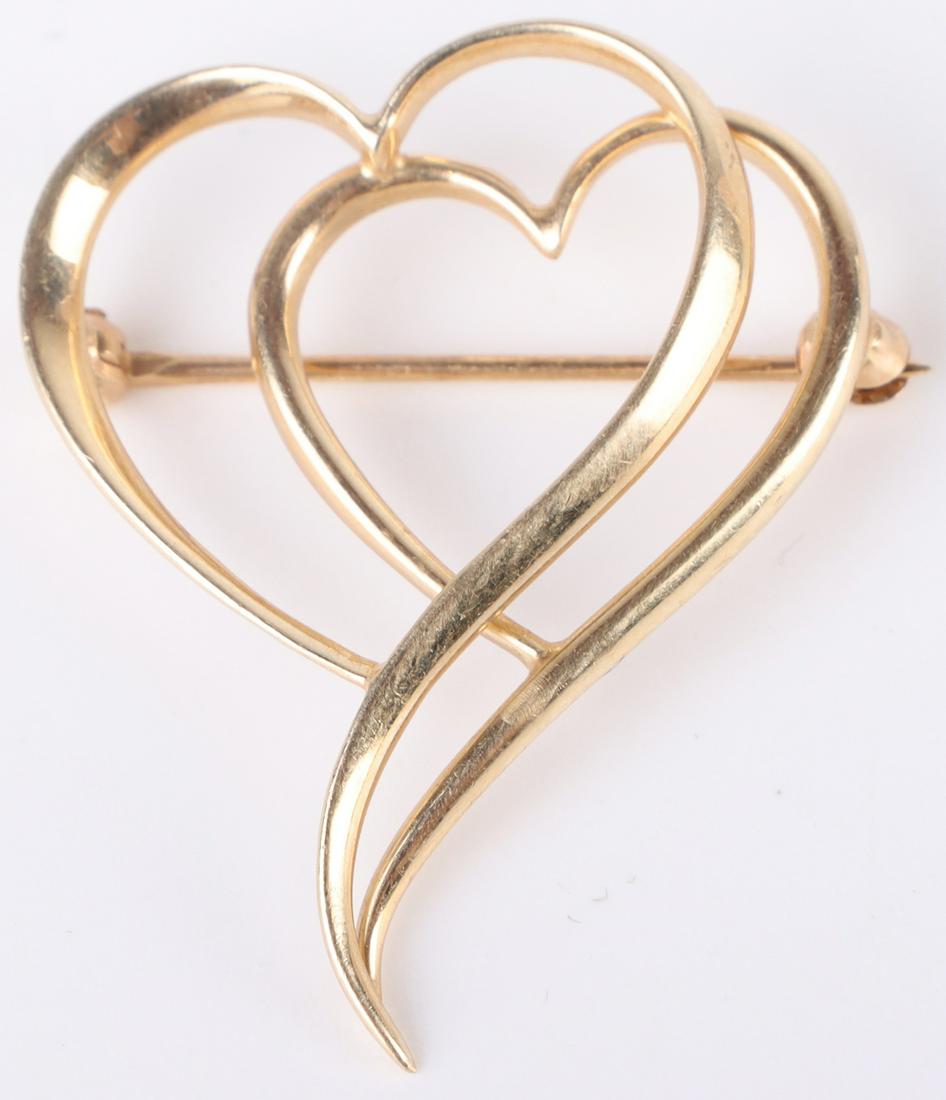 14K YELLOW GOLD LADIES HEART BROOCH: 147110 14K YELLOW GOLD LADIES HEART BROOCH 14k yellow gold ladies heart brooch. Weight: 2.7 Grams Size: 1.0" Length Condition: Very fine.