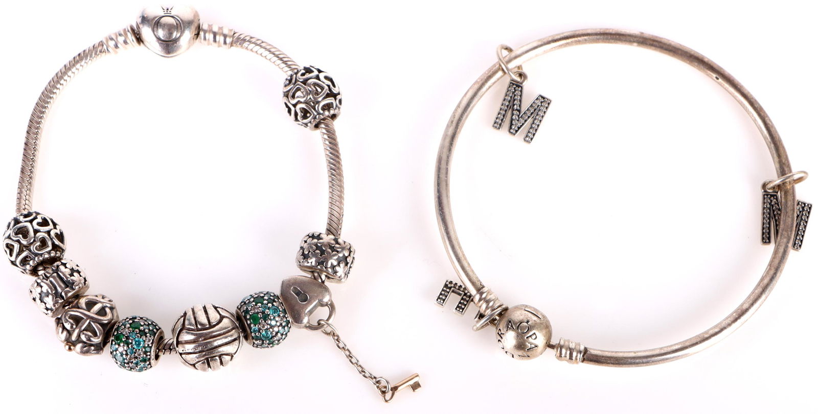 GENUINE PANDORA STERLING SILVER CHARM BRACELETS: 151042 GENUINE PANDORA STERLING SILVER CHARM BRACELETS Genuine Pandora genuine sterling silver ladies charm bracelets. Weight: 50.7 Grams Size: 7.5" LengthCondition: Very fine.