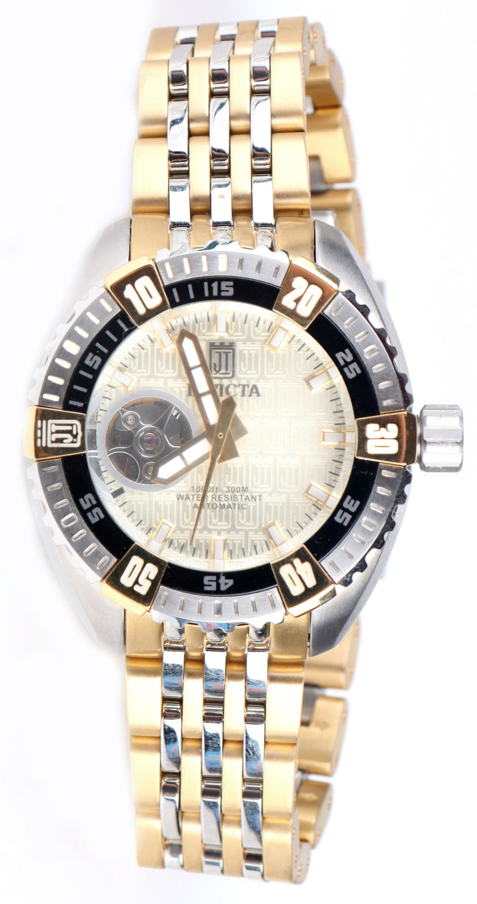 INVICTA JASON TAYLOR AUTOMATIC GOLD-TONE WATCH: 156177 INVICTA JASON TAYLOR AUTOMATIC GOLD-TONE WATCH Invicta Jason Taylor automatic gold-tone wristwatch model no. 15887. Caliber: NH38A. Water resistance 300M. Stainless steel Wristwatch Invicta Uni