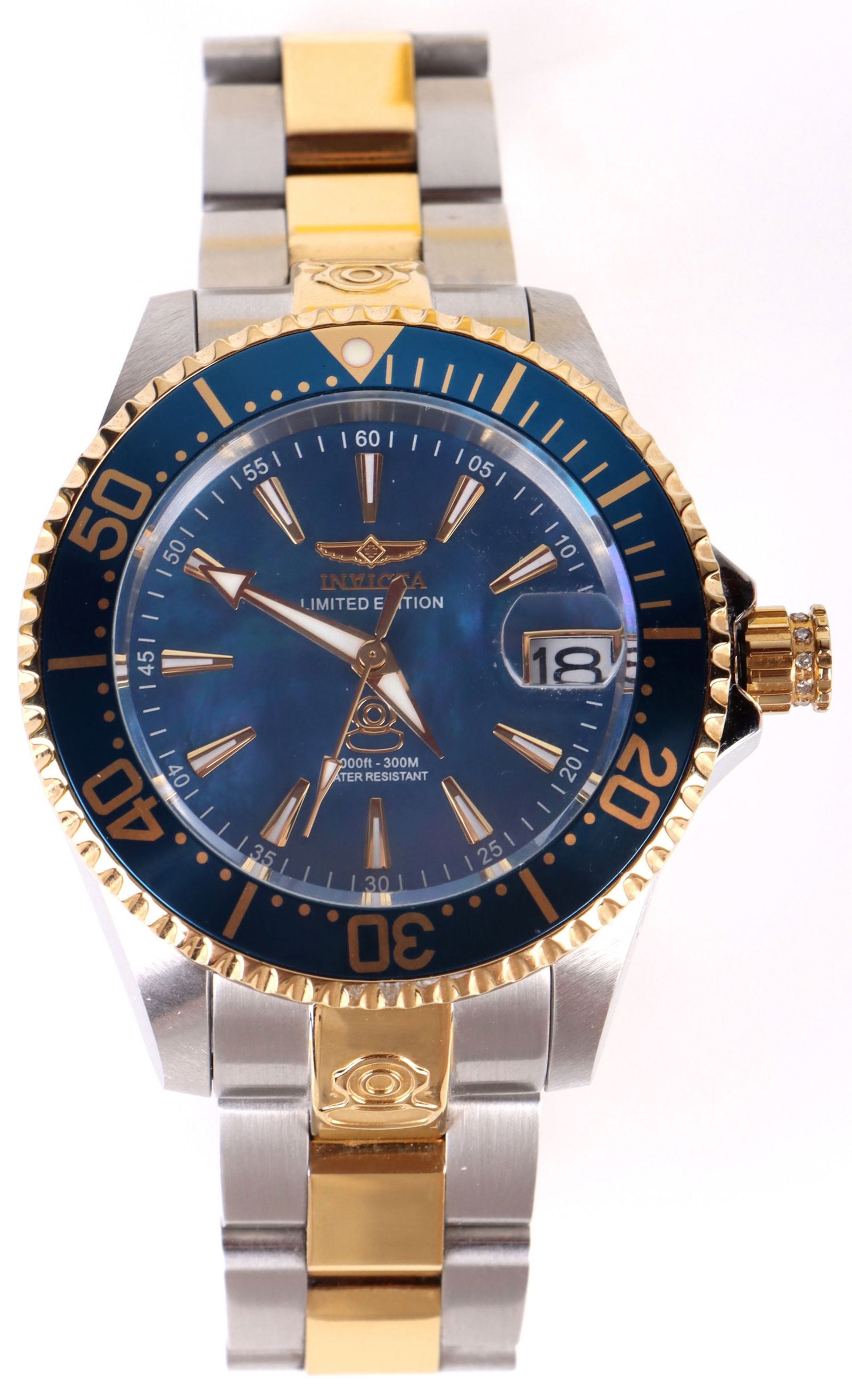 INVICTA GRAND DIVER TWO-TONED 3D BLUE DIAL WATCH: 163199 INVICTA GRAND DIVER TWO-TONED 3D BLUE DIAL WATCH Invicta Grand Diver two-toned 3D blue dial automatic men's wristwatch. Water-resistant up to 300 meters. Comes with a clear reverse and original
