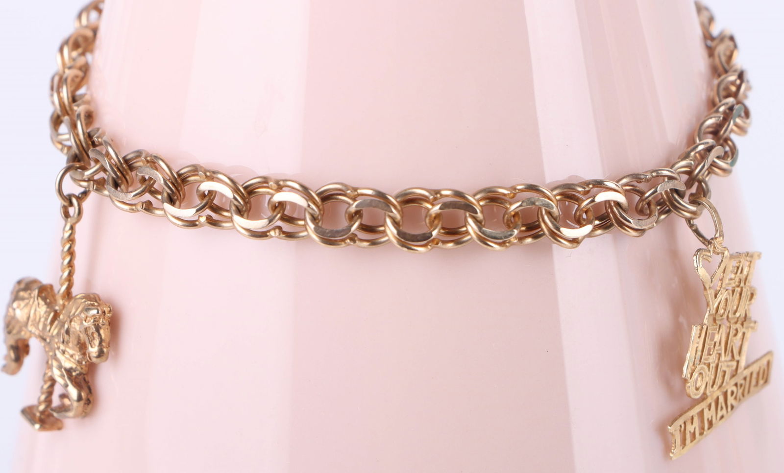 10K YELLOW GOLD BRACELET W/ 14K GOLD CHARMS: 168147 10K YELLOW GOLD BRACELET W/ 14K GOLD CHARMS 10k yellow gold bracelet with two 14k yellow gold charm bracelets. Weight: 10.00 Grams Size: 7.0" LengthCondition: Very fine.