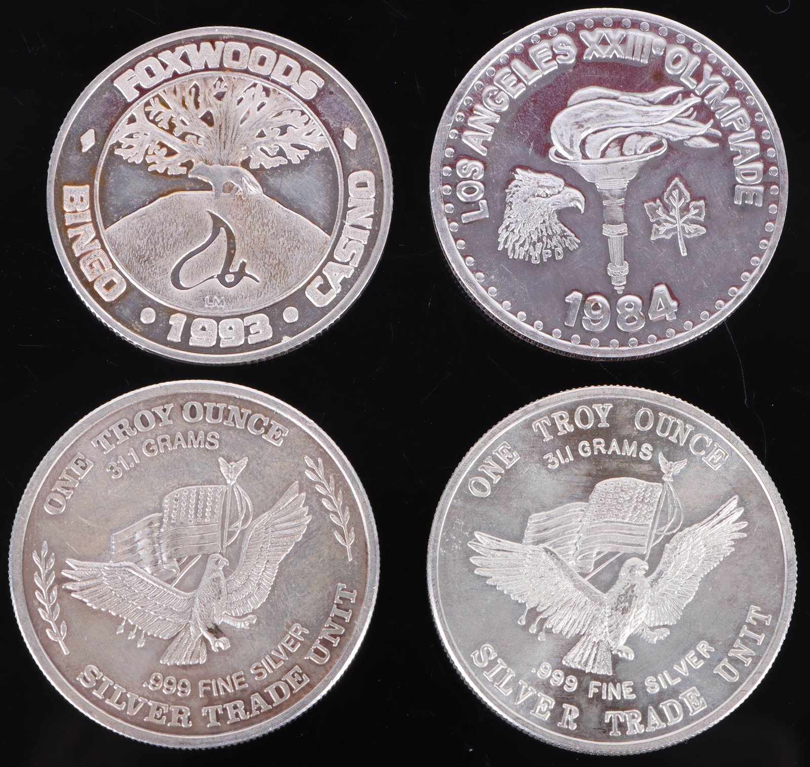 .999 FINE SILVER 1 OZT TADE & SOUVENIR COINS - (4): 168285 .999 FINE SILVER 1 OZT TADE & SOUVENIR COINS - (4) .9999 fine silver 1 ozt and 0.65ozt trade and souvenir coins - lot of 4. Weight: 3.65 Ozt Condition: Mint.