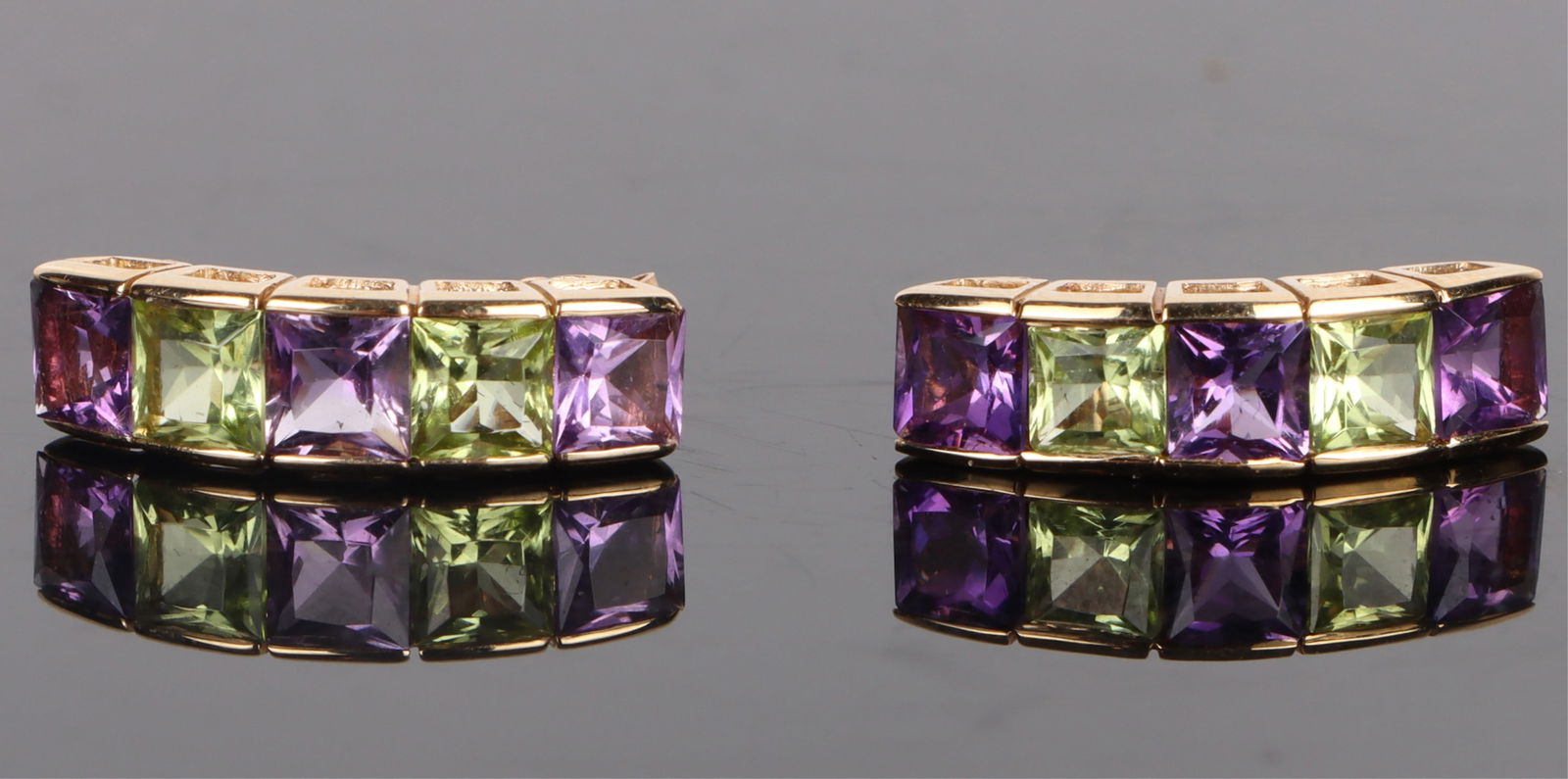 AMETHYST & PERIDOT 14K YELLOW GOLD EARRINGS: 169090 AMETHYST & PERIDOT 14K YELLOW GOLD EARRINGS 14k gold amethyst peridot earrings princess cut. Three 0.37 ct amethyst and two 0.37 ct peridot gemstones per each earring. Stone Type: AssortedWeigh