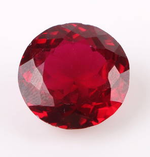 16.40CT GENUINE LOOSE ROUND RED RUBY W/ CERT: 171063 16.40CT GENUINE LOOSE ROUND RED RUBY W/ CERT 16.40CT genuine round red ruby. Gemstone is electronically tested and identified. Certification has not been verified. Stone Type: RubyWeight: