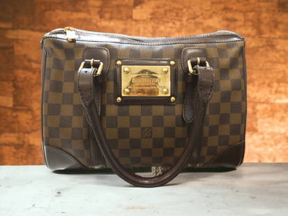 LOUIS VUITTON DAMIER EBENE BERKELEY HANDBAG: 171254 LOUIS VUITTON DAMIER EBENE BERKELEY HANDBAG Louis Vuitton Damier Ebene Berkely handbag. Never Used. We guarantee this is an authentic Louis Vuitton item or 100% of your money back.Size: 9 X 7.7