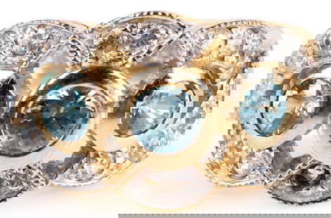 BLUE & WHITE TOPAZ 10K YELLOW GOLD RING: 172029 BLUE & WHITE TOPAZ 10K YELLOW GOLD RING 10k white gold ladies ring with one .5ct center blue topaz, two .33ct blue topaz surrounded by small white topaz gemstones. Stone Type: TopazWeight: 7.5