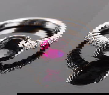 14K WHITE GOLD 1.24CT GARNET DIA RING W/ CERT: 172042 14K WHITE GOLD 1.24CT GARNET DIA RING W/ CERT 14k white gold rhodolite garnet diamond ladies ring with one 1.239CT oval rhodolite garnet, and ten 0.051ctw round diamonds. Ring comes with certif
