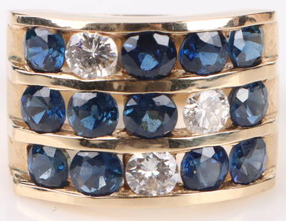 14K YELLOW GOLD DIAMOND SAPPHIRE LADIES RING: 172057 14K YELLOW GOLD DIAMOND SAPPHIRE LADIES RING 14k yellow gold diamond sapphire ladies ring with three 0.20ct round diamonds and twelve 0.20ct round blue sapphires. Stone Type: AssortedWeight: 12