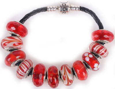 RETIRED PANDORA CHARMS BLACK LEATHER BRACELET: 172102a RETIRED PANDORA CHARMS BLACK LEATHER BRACELET Christmas themed Pandora black leather bracelet with 1 retired Murano glass red and white charms. Great gift idea! Condition: Like New