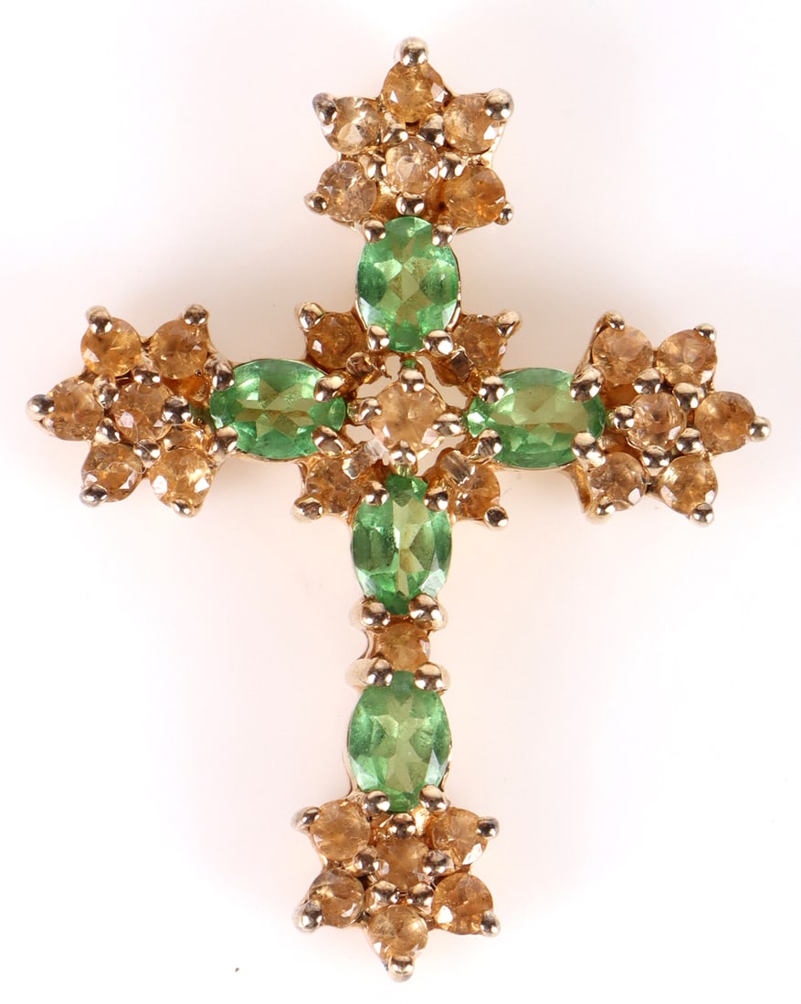 10K YELLOW GOLD TSAVORITE CROSS PENDANT: 172152 10K YELLOW GOLD TSAVORITE CROSS PENDANT 10k yellow gold tsavorite cross pendant features arrangement of tsavorite stones with flaired edges. Stone Type: JadeiteCondition: Very fine. See images.