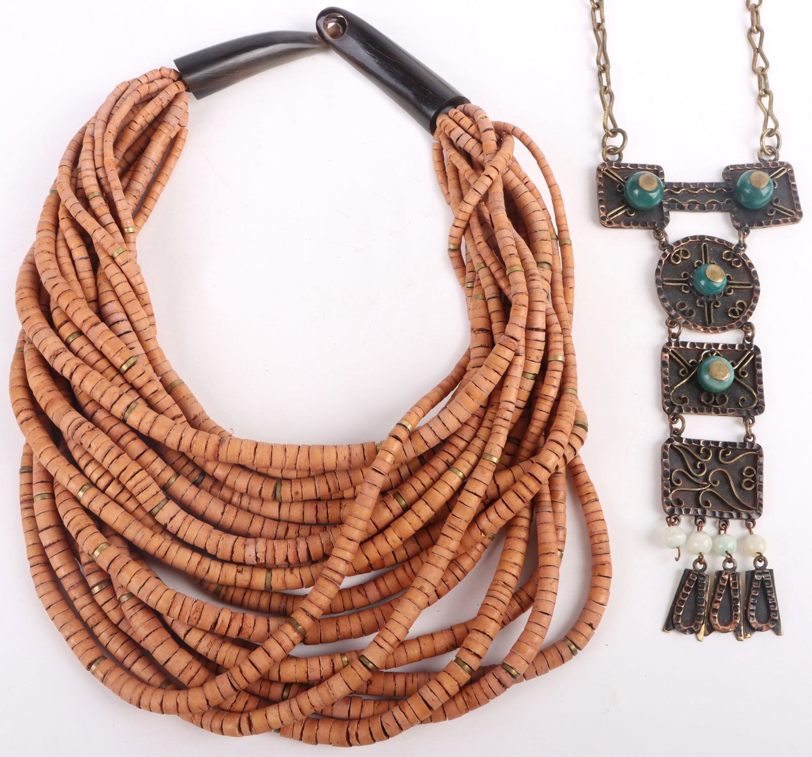 MEXICO STERLING & BONE BEADED NECKLACES - (2): 173188 MEXICO STERLING & BONE BEADED NECKLACES - (2) Mexico sterling silver stamped necklace with clay beads and one bone beaded wooden layered necklace. Stone Type: AssortedWeight: 98.7 Grams (sterli