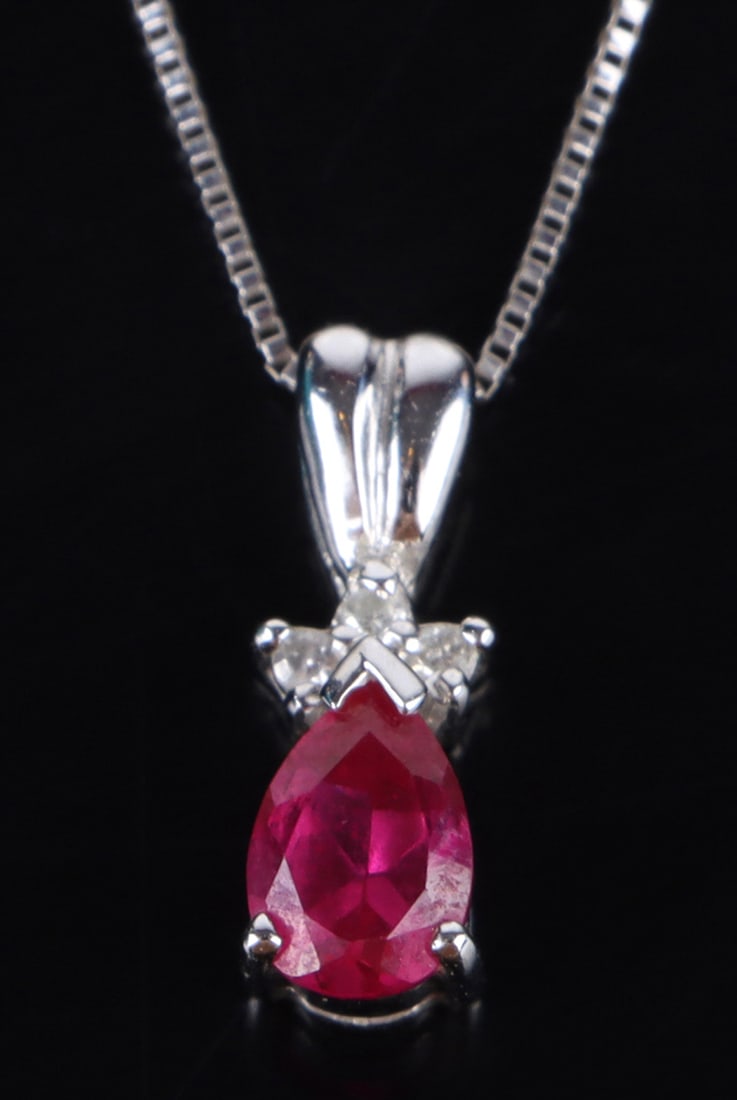PINK SAPPHIRE 14K WHITE GOLD LADIES NECKLACE: 178202 PINK SAPPHIRE 14K WHITE GOLD LADIES NECKLACE 14k white gold sapphire ladies necklace with one 0.40ct pear-cut pink sapphire necklace. Stone Type: Sapphire Size: 20" length Condition: Very fine.