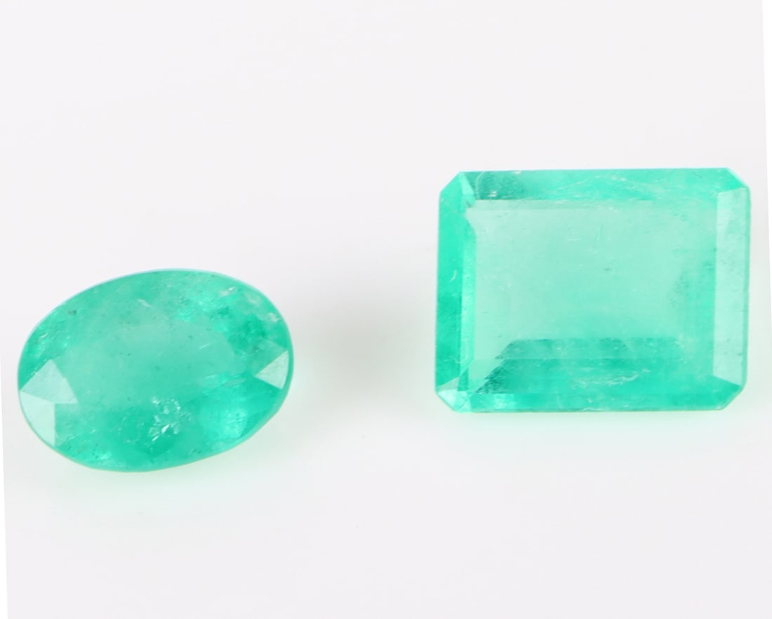 7.85CTW BRAZILIAN & COLOMBIAN EMERALDS - LOT OF 2: 179254 7.85CTW BRAZILIAN & COLOMBIAN EMERALDS - LOT OF 2 7.85CTW Brazilian and Colombian emeralds to include one 2.60 Brazilian oval emerald and one 5.25ct Colombian emerald-cut emerald. Gemstone is e