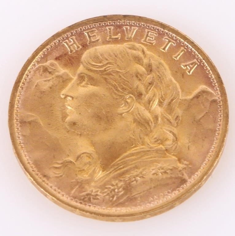 1935 90% GOLD COIN 20 FRANCS SWISS HELVETIA: 1935 L B 90% gold 20FR Swiss Helvetia coin.Weight: 6.4516 GramsCondition: Near mint.