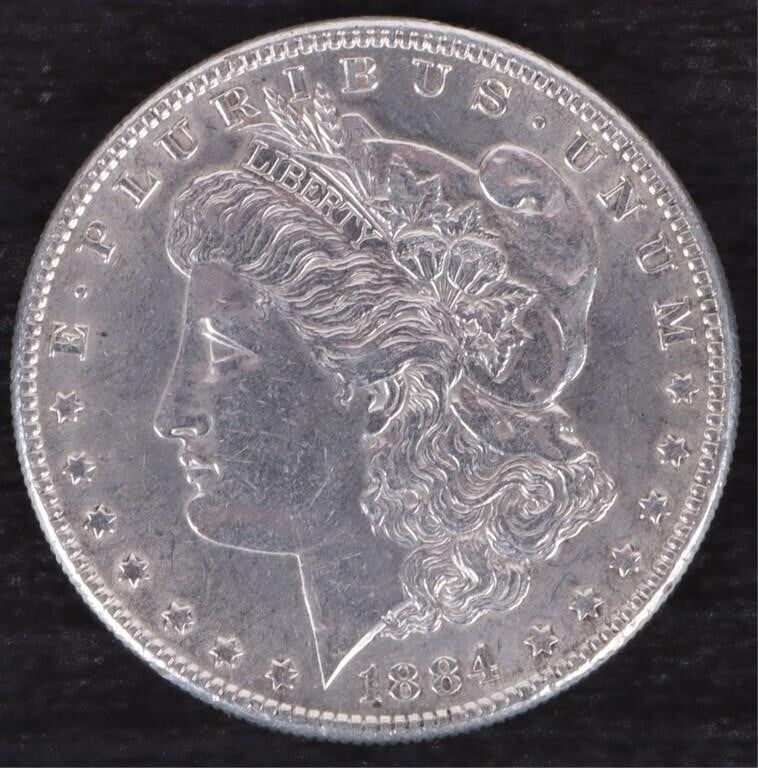 1884 MORGAN SILVER DOLLAR - BRILLIANT - 90% SILVER (1 of 2)