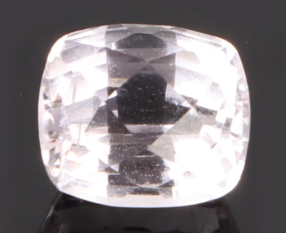 5.20 CT LOOSE CUSHION CUT MORGANITE GEMSTONE: 5.20 ct cushion cut morganite gemstone. Stone has been electronically tested by us and identified, tester does not distinguish between natural and lab grown.Stone Type: SapphireCondition: Fine. please