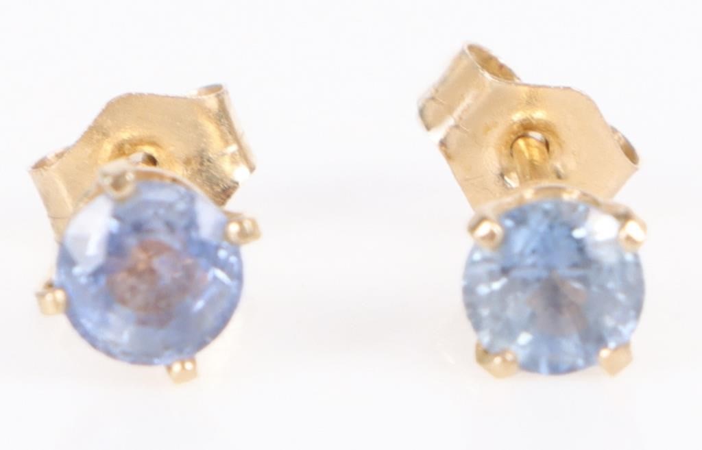 14K YELLOW GOLD BLUE TOPAZ LADIES STUD EARRINGS: 14k yellow gold blue topaz ladies stud earrings with two 0.30ct round topaz. Stone Type: Topaz Size: 0.6" Length Condition: Very fine.