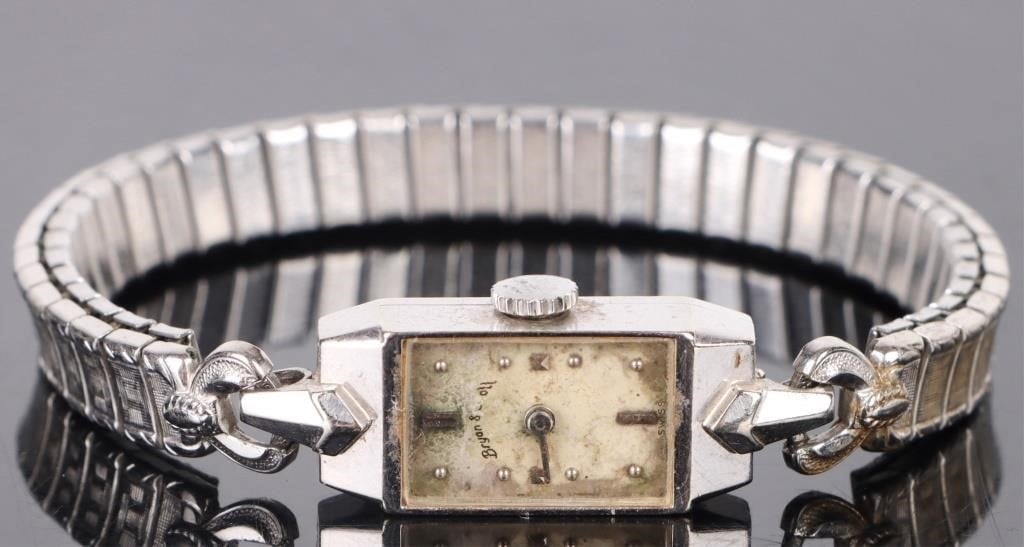 ANTIQUE 14K WHITE GOLD LADIES 17J WRISTWATCH: Antique 14k white gold ladies 17 jewels wristwatch. Back of the watch is monogrammed, the watch brand has been worn down on the watch over time. Only the watch case is 14k white gold, band is plated g