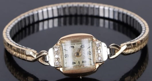14K GOLD HARVEL LADIES DIAMOND WATCH