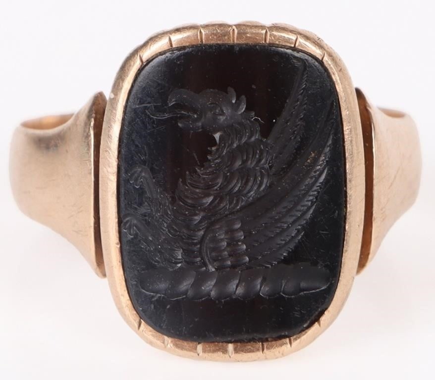 14K YELLOW GOLD CARVED ONYX UNISEX RING: 14k yellow gold carved onyx unisex ladies ring. Ring is engraved in the reverse. Weight: 4.9 Grams Size: US 8 Condition: Very fine.