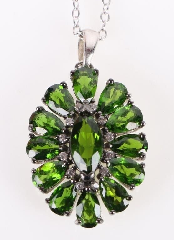 GREEN SPINEL STERLING SILVER LADIES NECKLACE: Green spinel sterling silver necklace measuring 18" in length. Stone Type: Spinel Weight: 3.44 Grams Size: 18" Length Condition: Very Fine