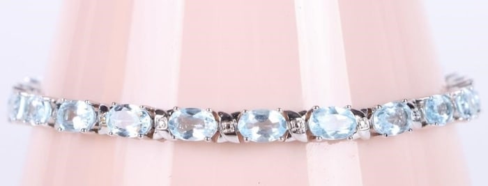 6.6CTW BRIGHT BLUE TOPAZ STERLING SILVER BRACELET