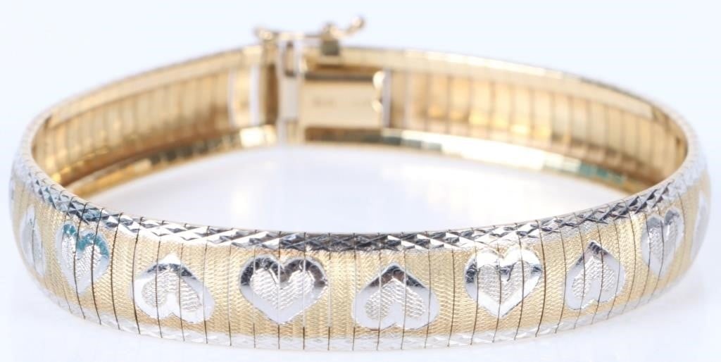 10K YELLOW & WHITE GOLD HEARTS BRACELET: 10 Kt. Yellow & White Gold Hearts Bracelet. Weight: 13.17 grams Condition: Very fine. See images.