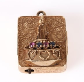 14K YELLOW GOLD RUBY & SAPPHIRE MUSIC BOX PENDANT