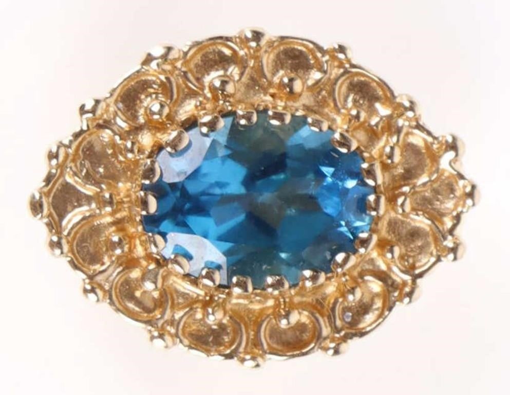 14K YELLOW GOLD BLUE SPINEL LADIES SLIDING PENDANT: 14K yellow gold blue spinel ladies sliding pendant to include one 0.75ct oval cut blue spinel. Stone Type: Spinel Weight: 2.54 Grams Size: 0.63" Condition: Very fine.
