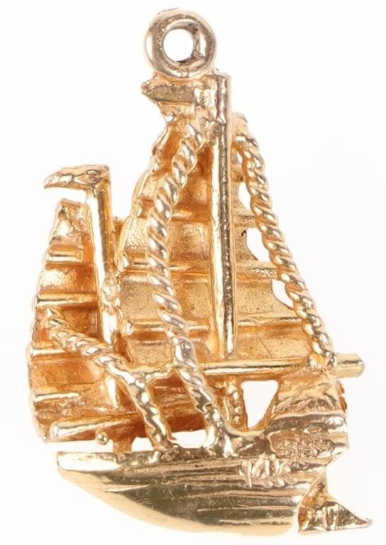 14K YELLOW GOLD LADIES SAILBOAT PENDANT: 14k yellow gold ladies sailboat pendant/charm. Weight: 4.23 grams Size: 1.0" length Condition: Very fine.