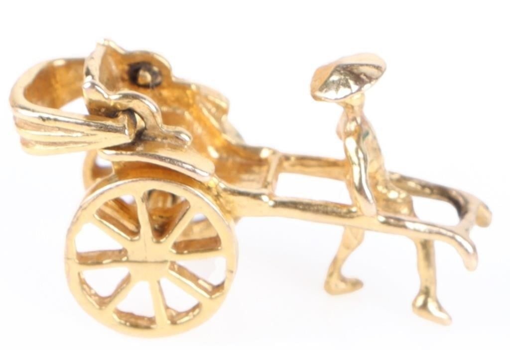 14K YELLOW GOLD LADIES RICKSHAW PENDANT: 14k yellow gold ladies rickshaw pendant/charm. Weight: 2.63 Grams Size: 0.75" length Condition: Very fine.