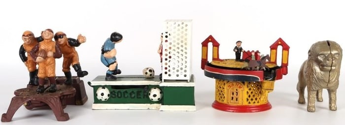 VINTAGE CAST IRON COIN BANKS - (4)