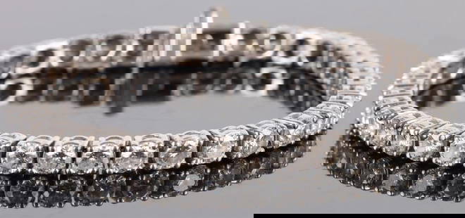 9.50CTW NATURAL DIAMOND 18K WHITE GOLD BRACELET: 9.50CTW natural diamond 18k white gold ladies tennis bracelet. Bracelet features thirty-eight 0.25ct round diamonds.Stone Type: DiamondWeight: 21.70 GramsSize: 7.0" LengthCondition: Very fine.