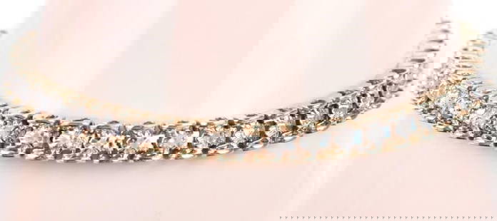 DIAMOND TENNIS BRACELET IN 10K YELLOW GOLD: 0.33CTW Diamond tennis bracelet in 10K yellow gold.Stone Type: DiamondWeight: 5.0 GramsSize: 7" LengthCondition: Missing 4 diamonds.