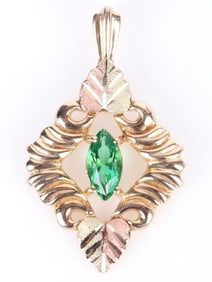 10K YELLOW GOLD GREEN CZ LADIES PENDANT