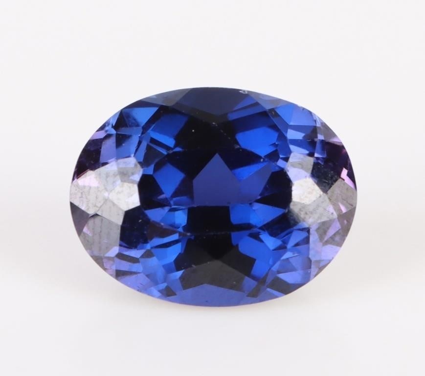 13.05CT BI-COLOR SAPPHIRE LOOSE GEMSTONE: 13.05ct oval-cut bi color (blue and purple) sapphire loose gemstone. Stone has been electronically tested and identified, tester does not distinguish between natural and lab grown. Stone Type: Sapphir