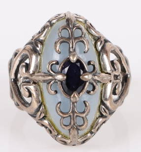 STERLING SILVER TANZANITE QUARTZ LADIES RING: Sterling silver tanzanite quartz ladies ring to include one 0.50ct oval cut tanzanite, and one 20.28 X 9.66mm oval cabochon quartz.Stone Type: AssortedWeight: 7.87 GramsSize: 6.25 U.S.Condition: Very