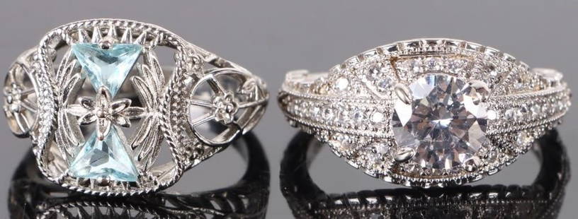 ORNATE FILIGREE CUBIC ZIRCONIUM STERLING RINGS: Ornate filigree cubic zirconium sterling silver ladies rings.Stone Type: CZWeight: 7.38 GramsSize: VariesCondition: Very fine. See images.