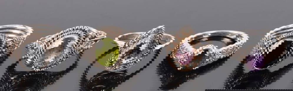 GEMSTONE STERLING SILVER LADIES RINGS: Gemstone sterling silver ladies rings to include peridot, garnet, amethyst, and more ladies rings.Stone Type: AssortedWeight: 17.0 GramsSize: Varies.Condition: Very fine.